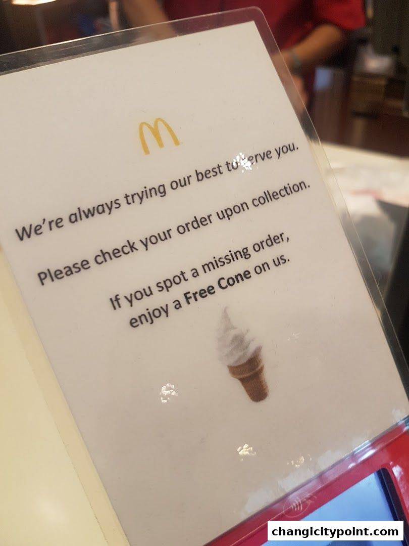 A sign at McDonald's offering a free cone for missing orders.