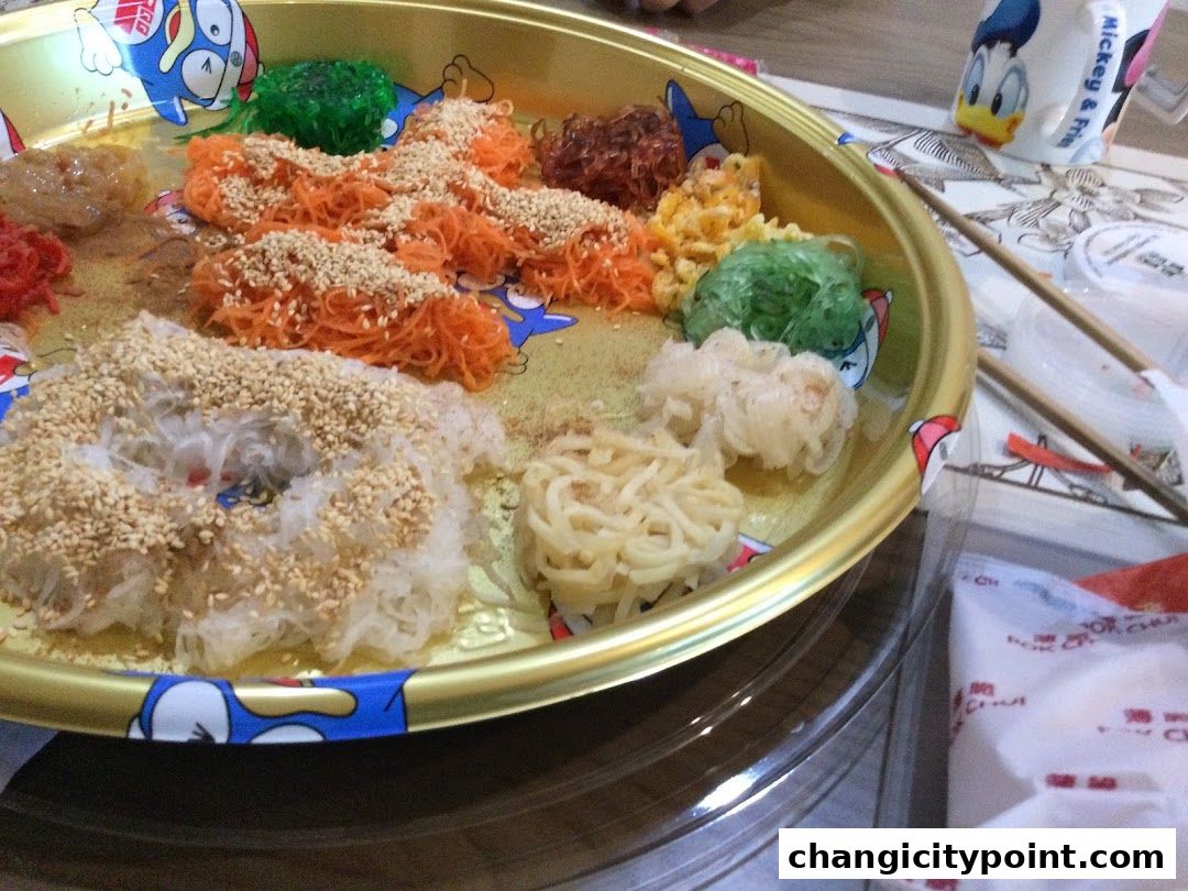 A platter of colorful ingredients for Yee Sang, a traditional Chinese New Year dish.