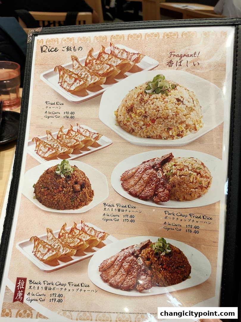 A menu page showcasing various rice dishes and gyoza sets from Menzo Butao.