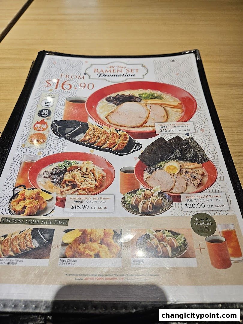 A menu featuring ramen sets, side dishes, and drinks with prices.