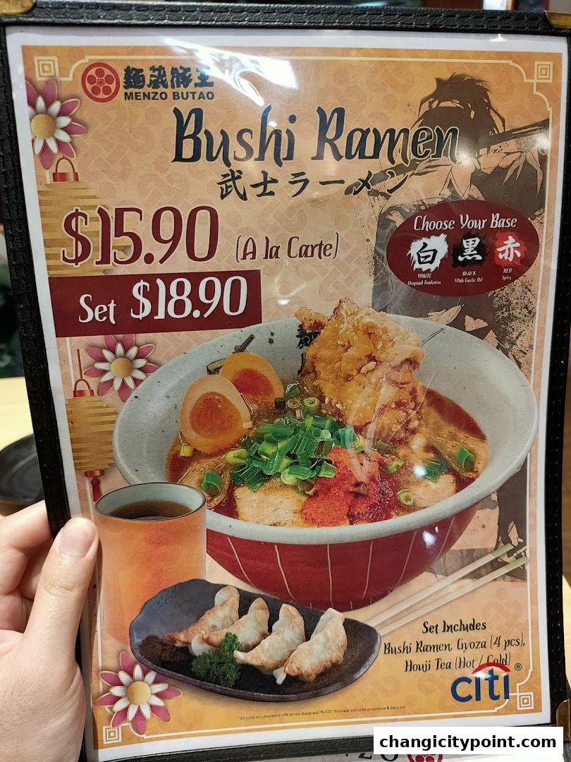 A menu for Menzo Butao's Bushi Ramen, featuring set and a la carte prices.