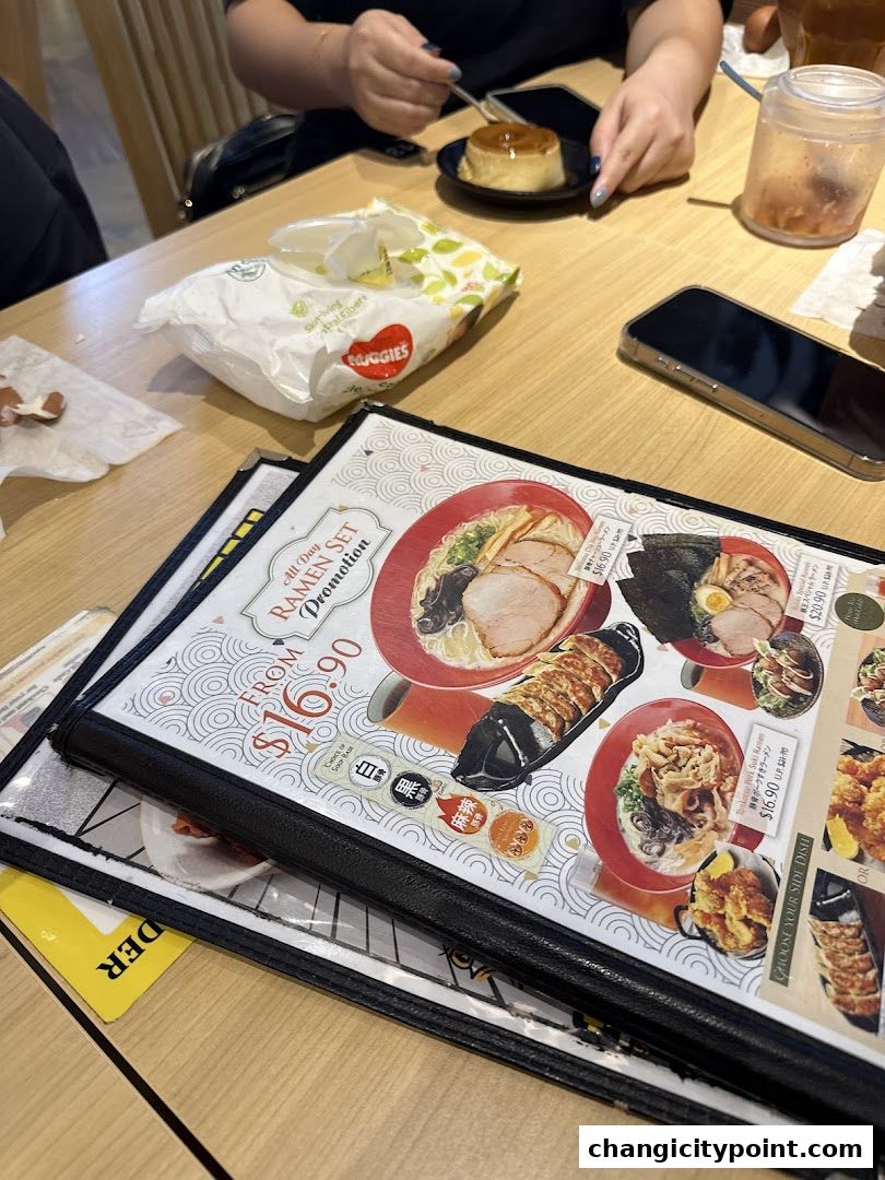 A menu featuring ramen sets and side dishes from Menzo Butao.
