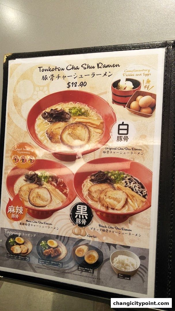 A menu showcasing various ramen dishes with toppings and prices.