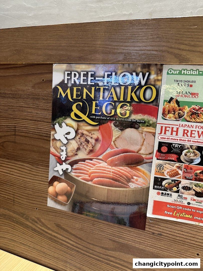 A promotional flyer for free-flow mentaiko and egg with purchase of any main.