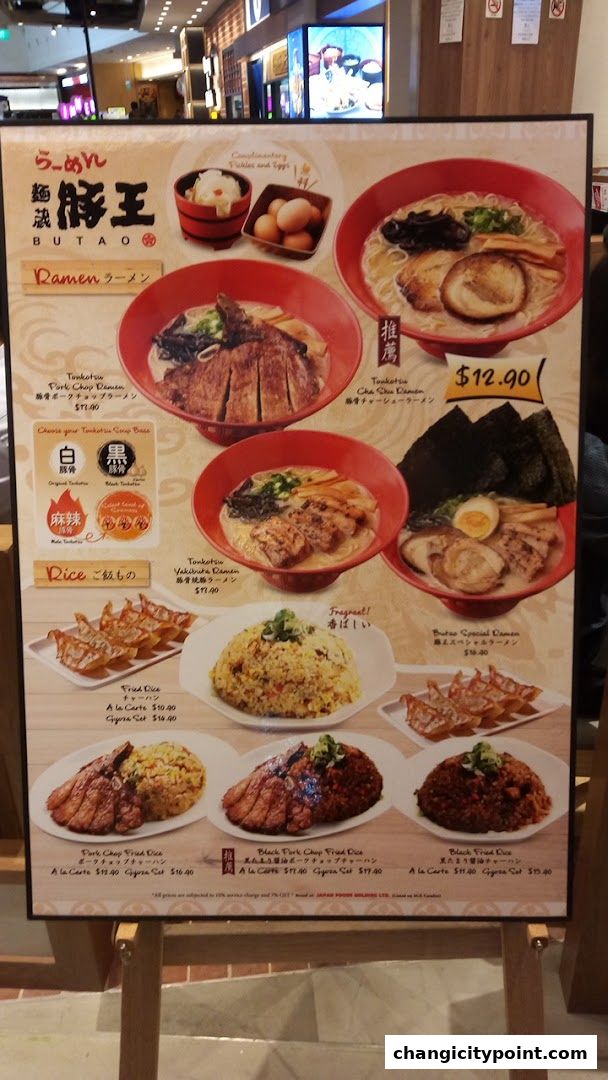 A menu board for Menzo Butao featuring various ramen, fried rice, and gyoza dishes.