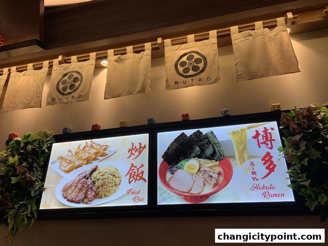 Illuminated displays showcase Hakata Ramen and Fried Rice at Menzo Butao.