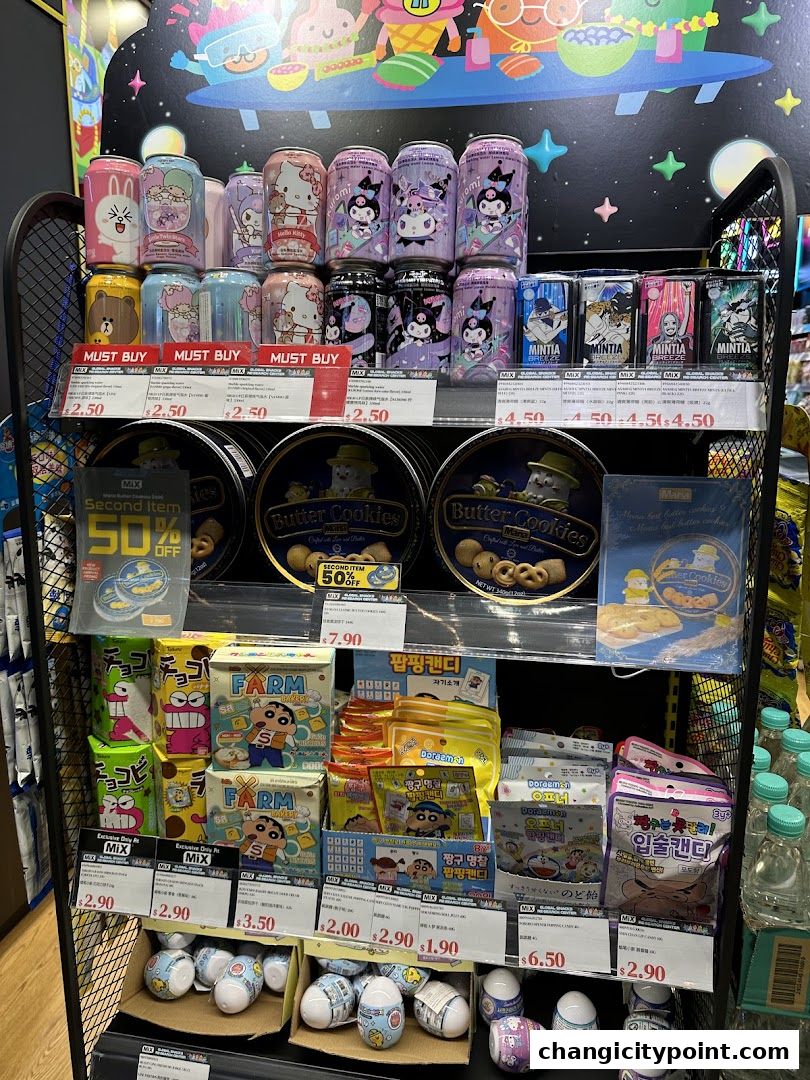 A display shelf in a store filled with various snacks, candies, and drinks featuring popular cartoon characters.