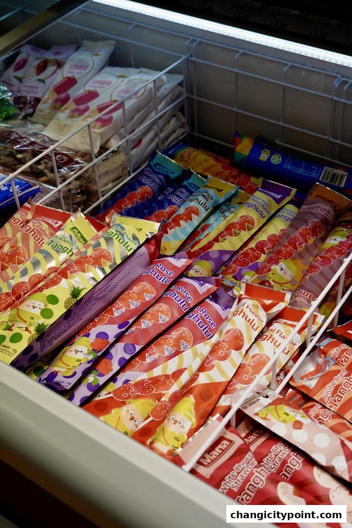 A freezer filled with various flavors of Tanghulu ice pops.
