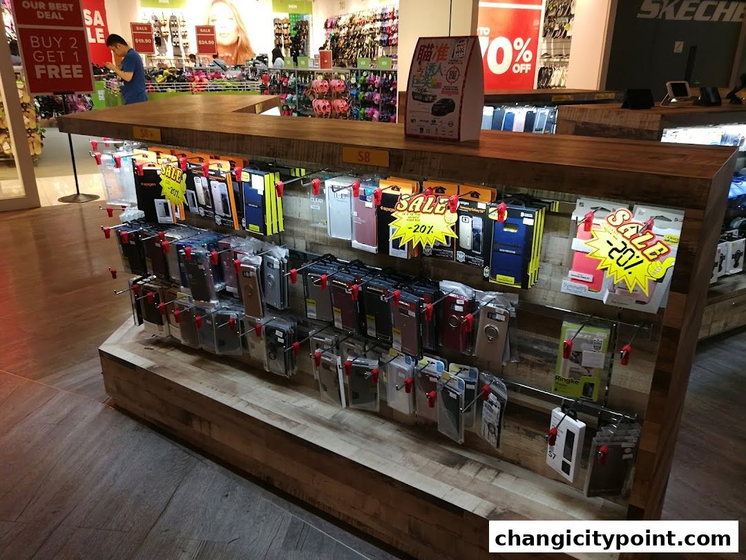 A display of phone cases and accessories with sale signs.