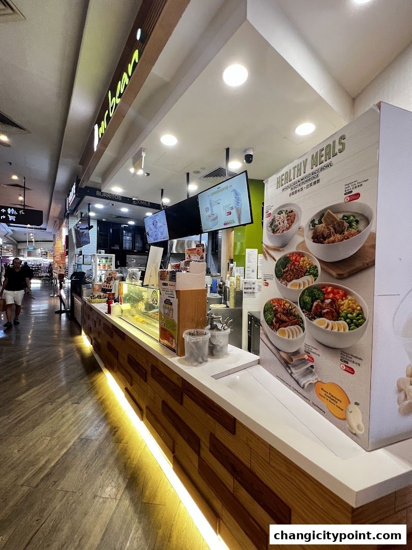 The Mr Bean shop counter with healthy meal options displayed.