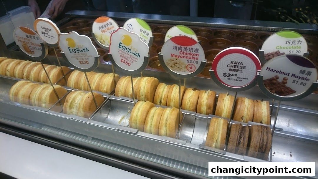 A display of freshly baked sweet and savory filled pastries at Mr Bean.