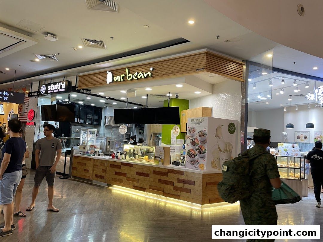The Mr Bean shop front with a wooden counter and display of healthy meals.