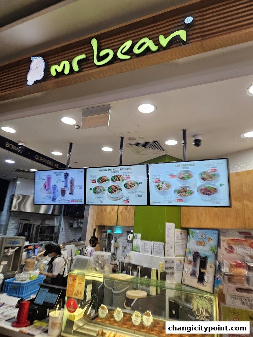 Mr Bean shop interior with digital menus displaying food and drinks.