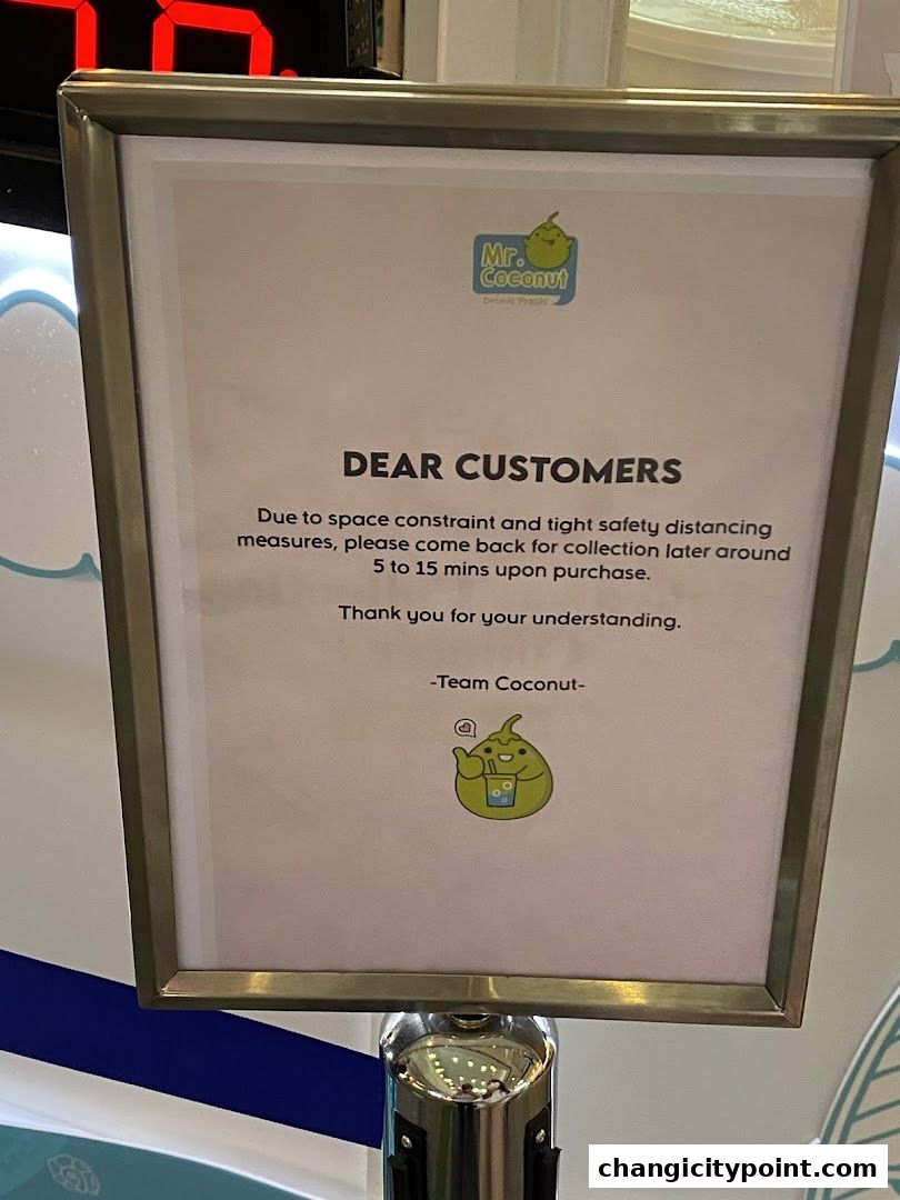 A sign from Mr. Coconut informing customers about collection delays due to space and safety measures.