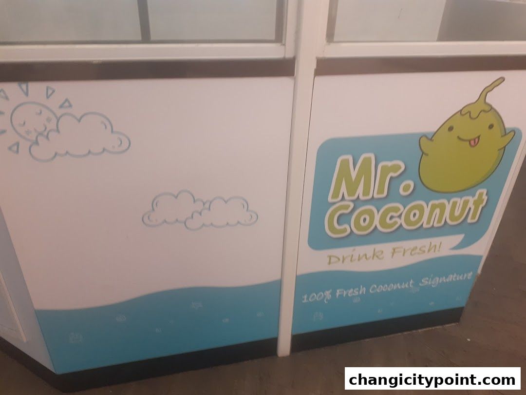 Mr. Coconut shop front with cartoon sun, clouds, and a coconut character.