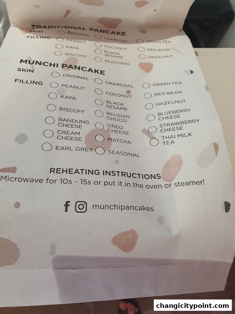 A menu for Munchi Pancakes, listing traditional and Munchi pancake options with various fillings and skins.