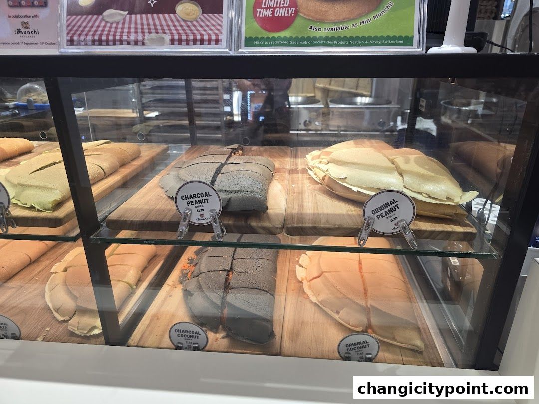 Display case filled with various flavors of freshly made pancakes.