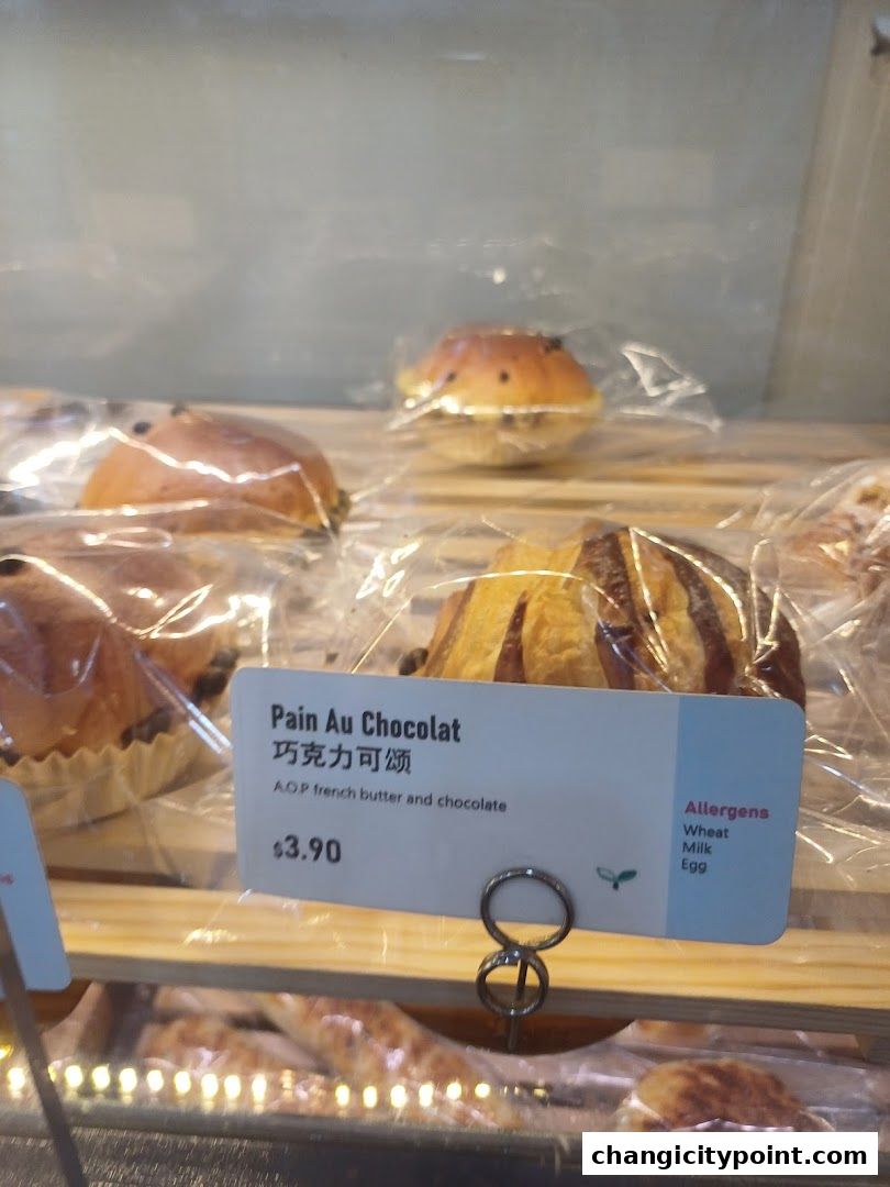 A display of freshly baked Pain Au Chocolat pastries at Muyoo Bakery.