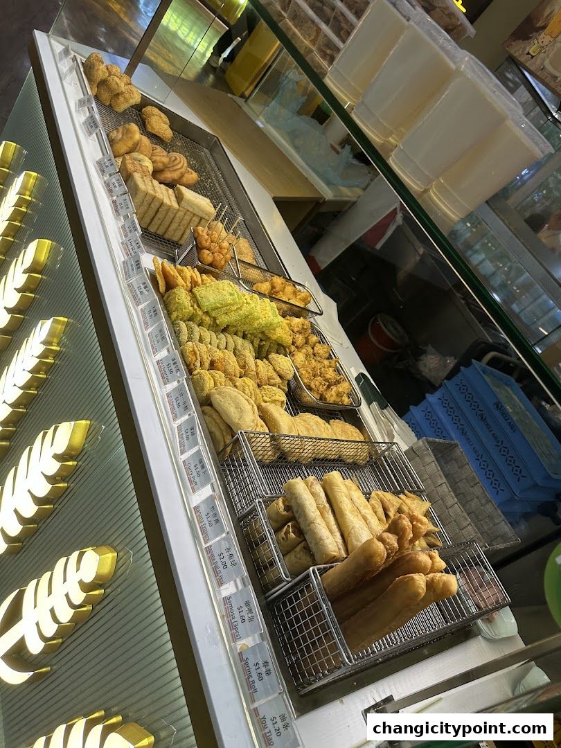 A display of various fried snacks and pastries at Old Chang Kee.