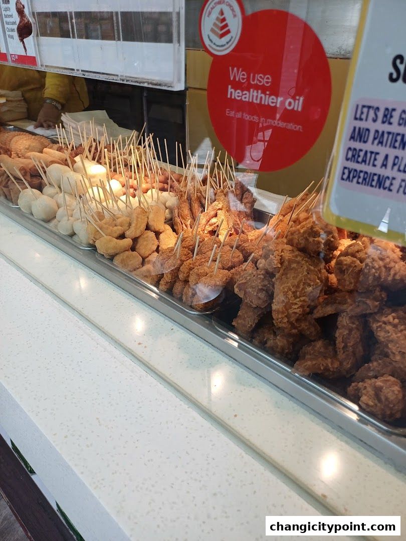 A display of various fried snacks on skewers at Old Chang Kee.