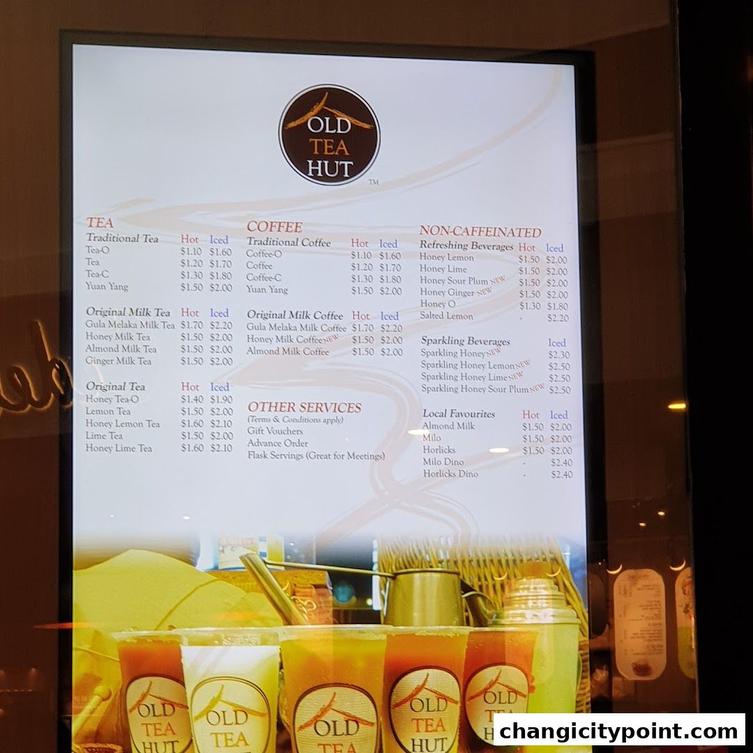 A menu board for Old Tea Hut featuring various tea, coffee, and beverage options.