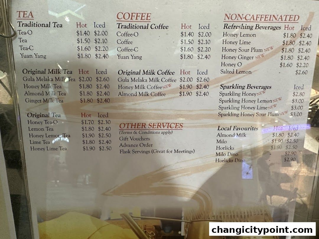 A menu board displaying various tea, coffee, and beverage options with prices.