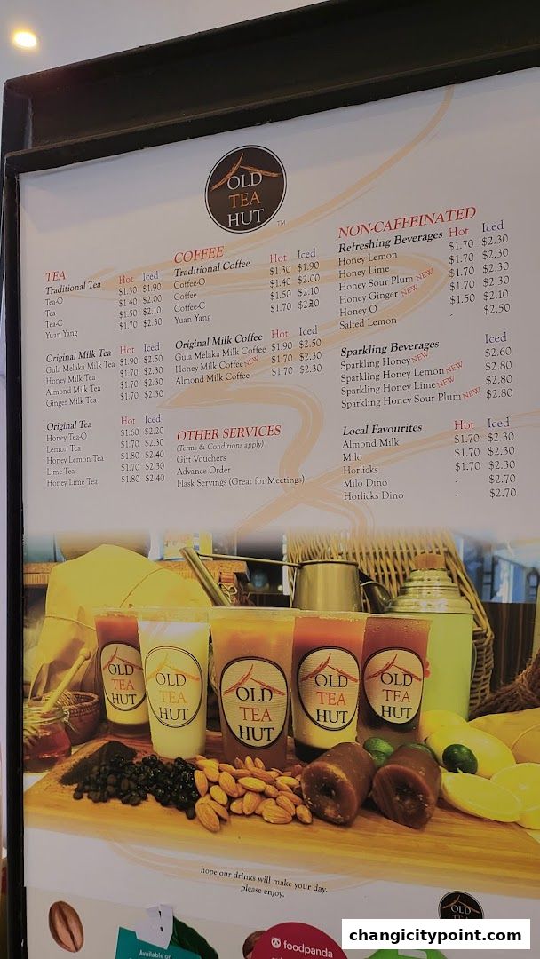 A menu board for Old Tea Hut featuring various tea, coffee, and beverage options with prices.