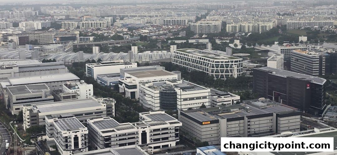 Aerial view of a sprawling urban landscape with numerous modern buildings and infrastructure.