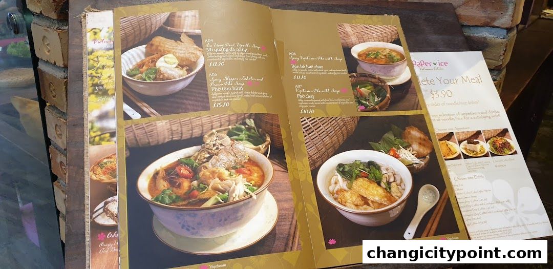 A menu from Paper Rice Changi City Point showcasing Vietnamese noodle dishes and meal deals.