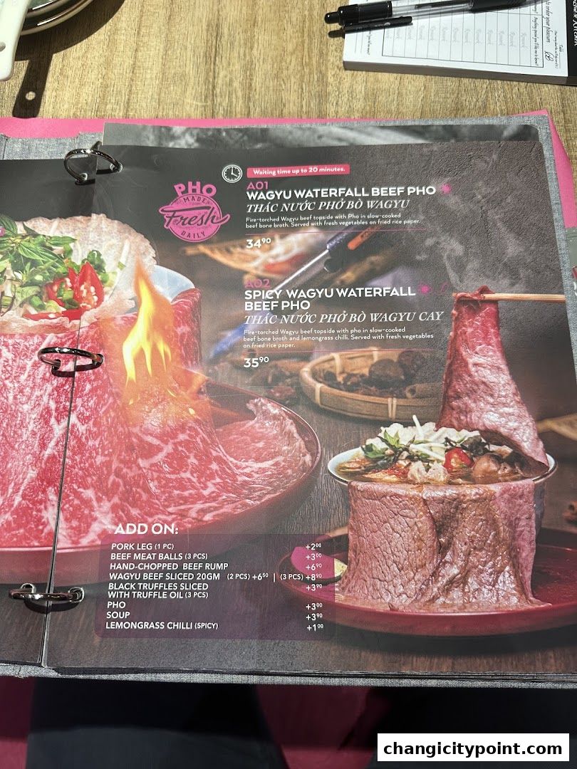 A menu featuring Wagyu beef pho dishes with add-on options.