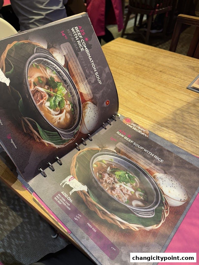 A menu page showcasing two Vietnamese beef soup dishes with rice.