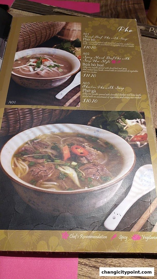A menu page showcasing various Pho dishes with appetizing images and descriptions.