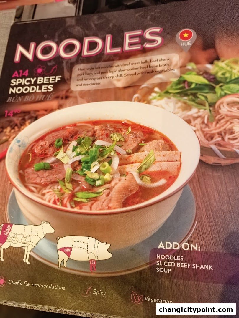 A menu item for Spicy Beef Noodles from Paper Rice, featuring a bowl of noodles and ingredients.