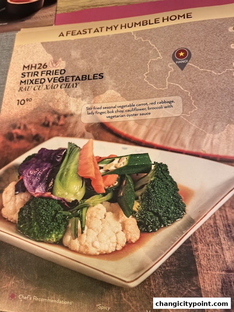 A menu item featuring stir-fried mixed vegetables with a description and price.
