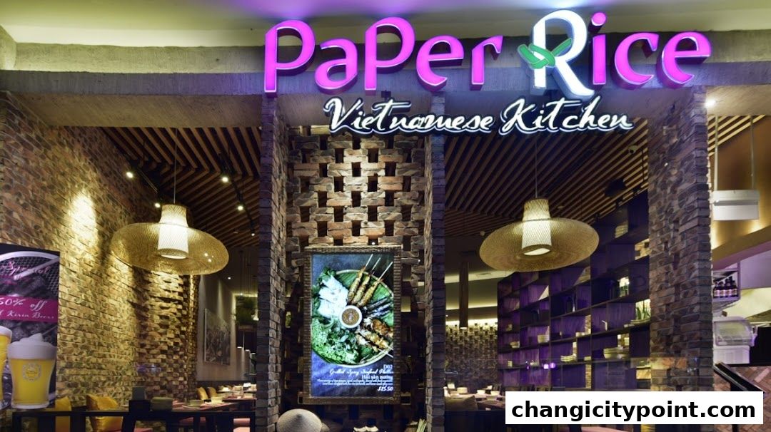 Interior of Paper Rice Vietnamese Kitchen with modern decor and seating.