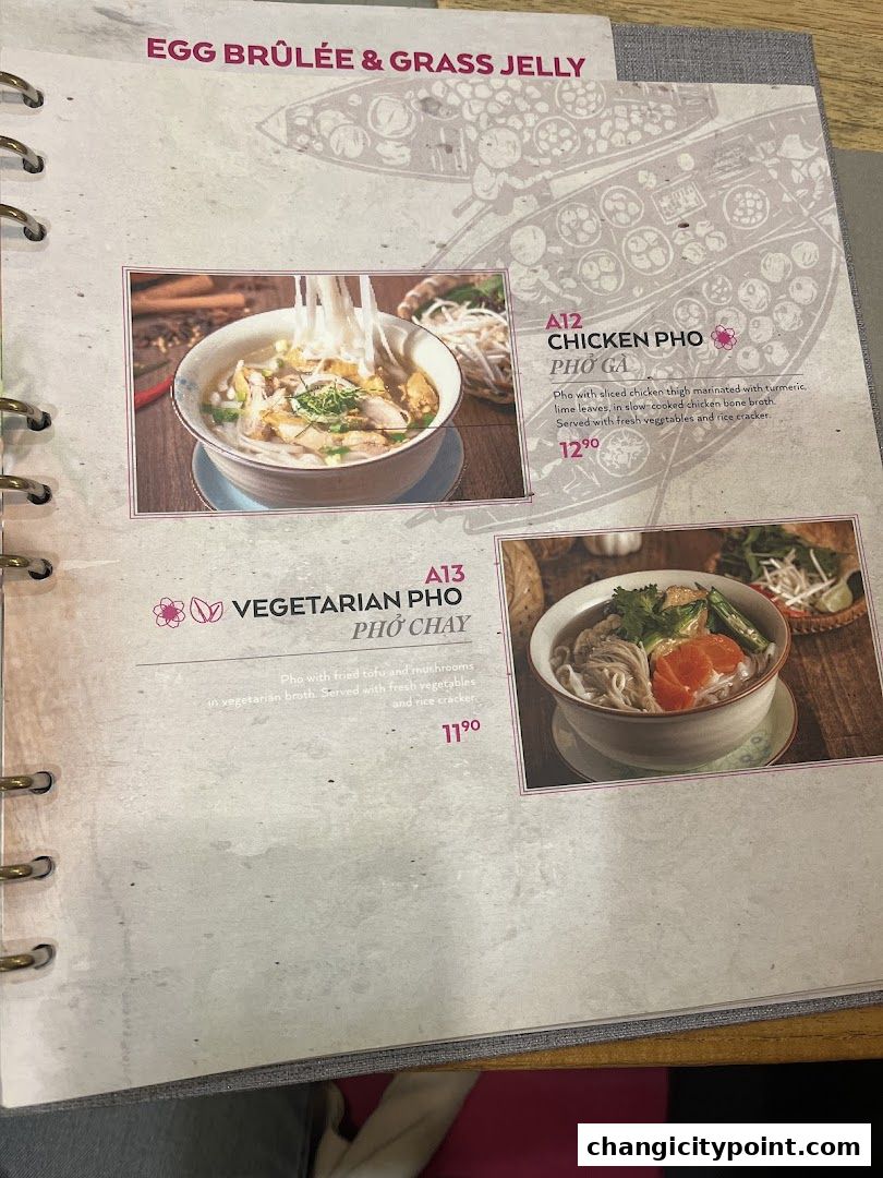 A menu page featuring Chicken Pho and Vegetarian Pho with prices.