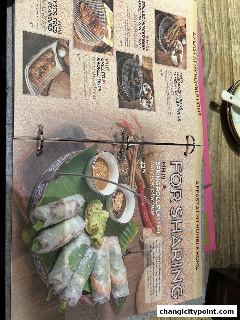 A menu page showcasing various Vietnamese dishes with appealing food photography.