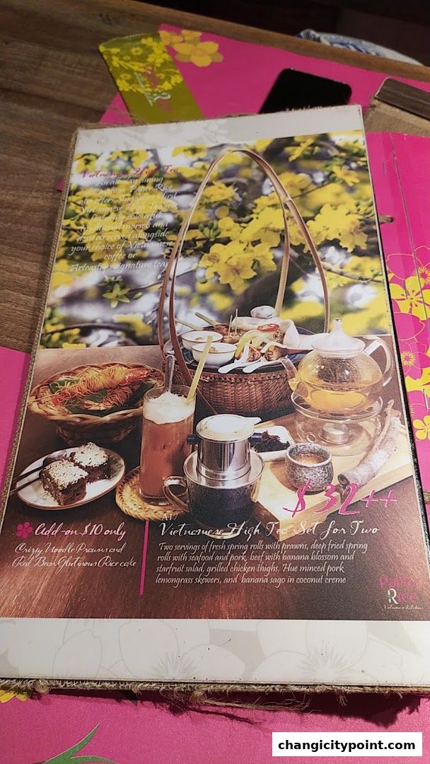 A menu featuring a Vietnamese High Tea Set for Two with various dishes and drinks.