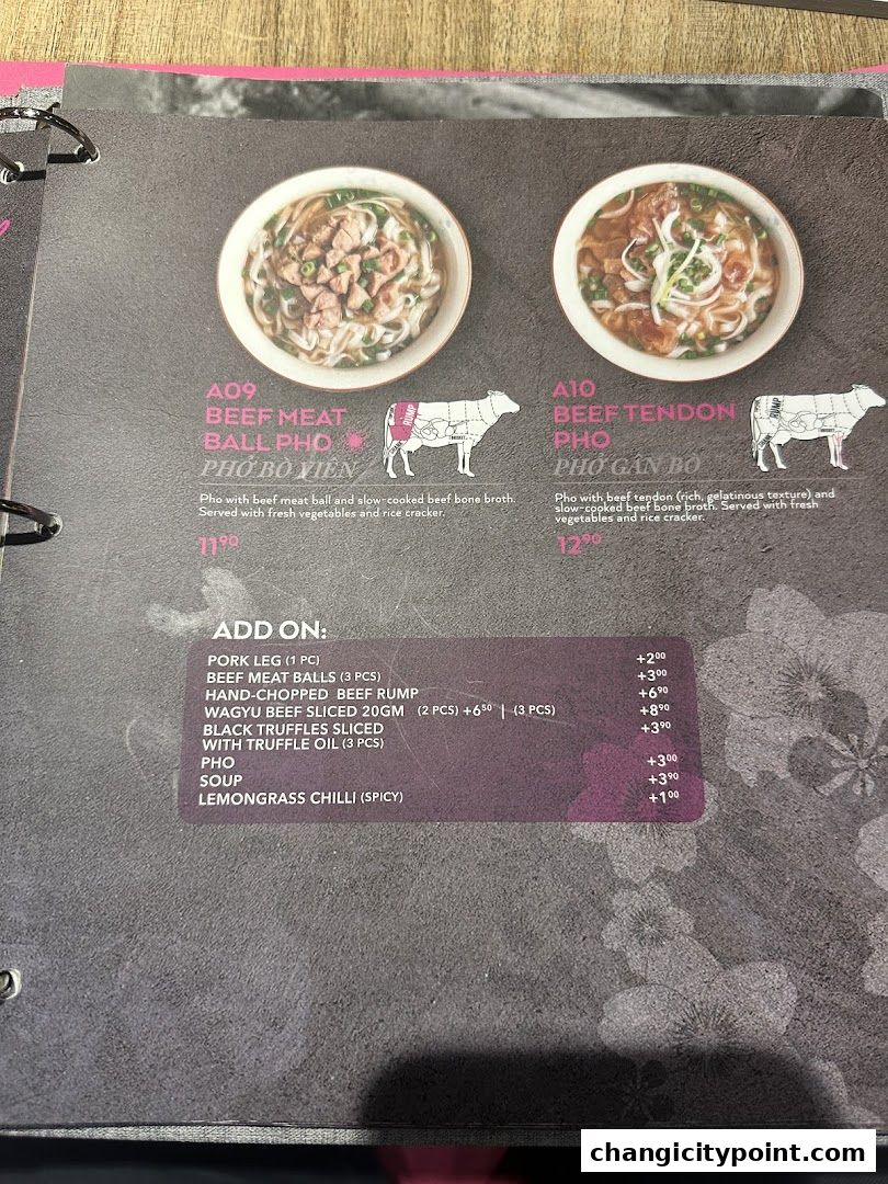 A menu page showcasing two pho dishes and various add-on options.