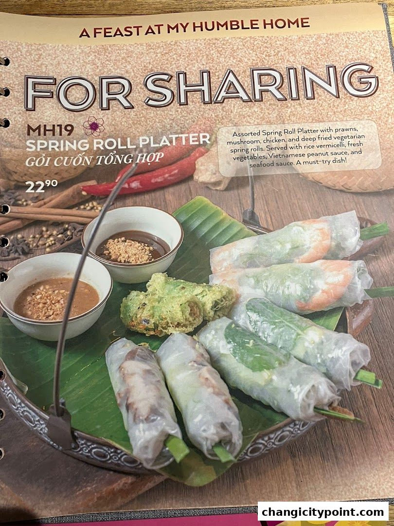 A menu page showcasing a 'Spring Roll Platter for Sharing' with dipping sauces.