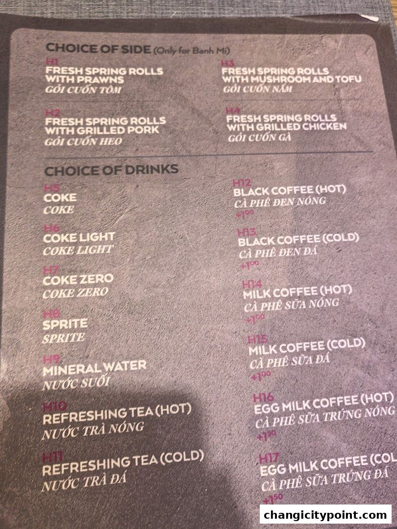 A menu featuring choices of sides and drinks, including spring rolls, coffees, and teas.