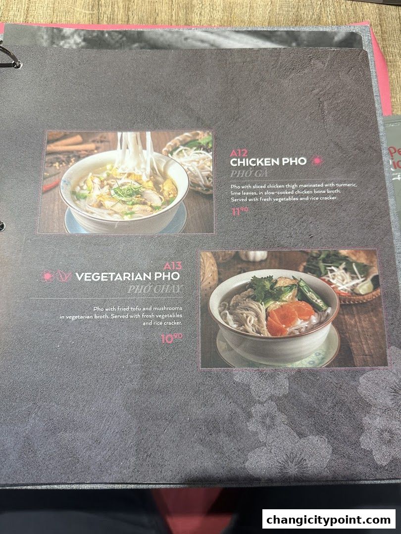A menu page showcasing two pho dishes with descriptions and prices.