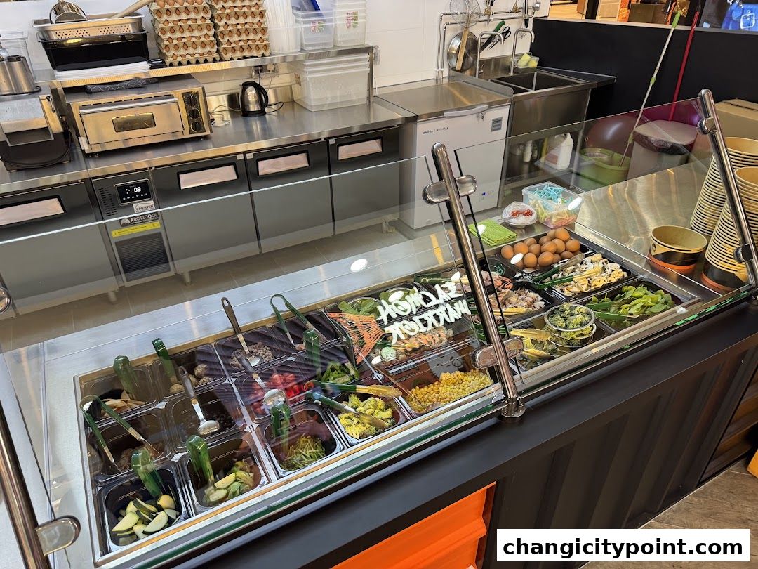 A display of fresh ingredients for pasta and salads at Pasta Express.