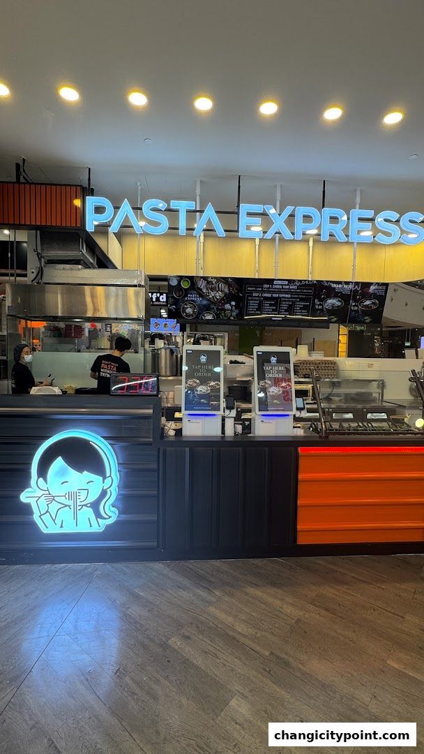 Pasta Express shop front with neon sign, ordering kiosks, and staff preparing food.