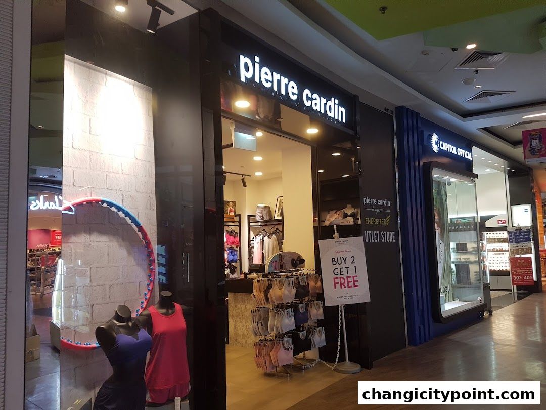 Pierre Cardin Lingerie shop front with mannequins and sale signage.