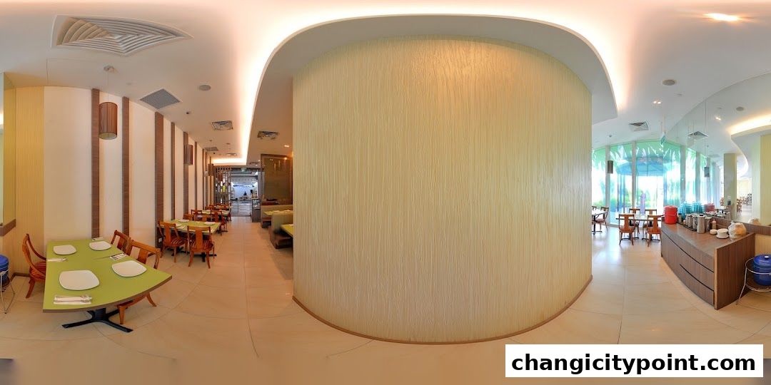 Interior view of a restaurant with tables, chairs, and a buffet counter.