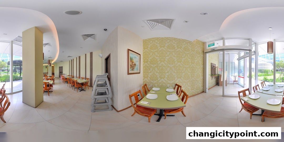 Interior view of Pondok Kartika restaurant with tables set for dining.