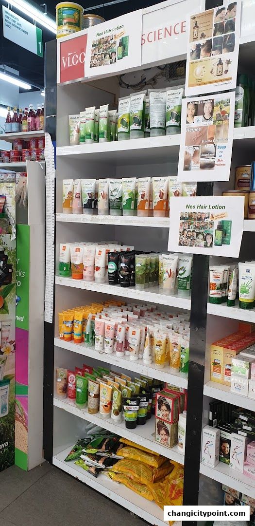 Shelves stocked with various personal care products, including lotions, soaps, and hair care items.