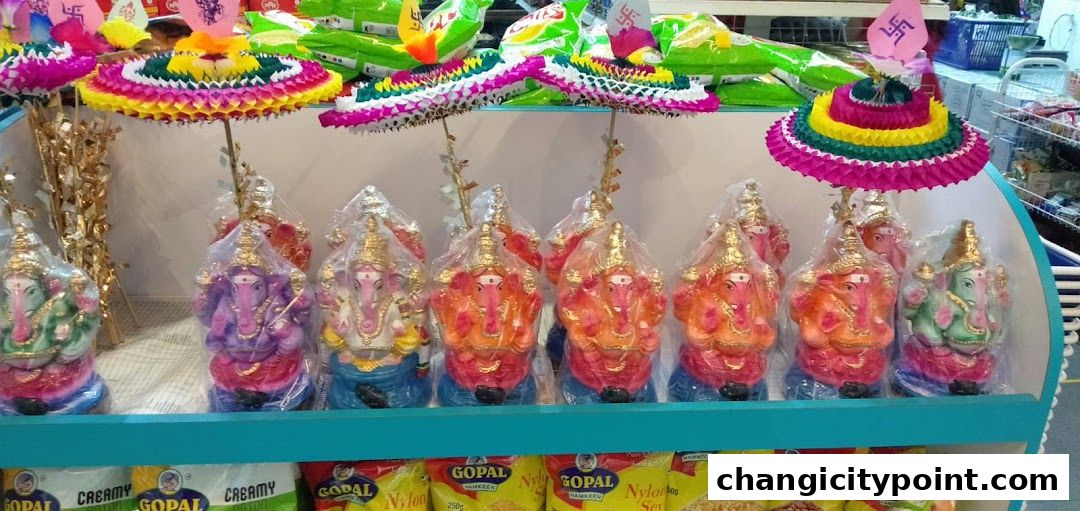 Colorful Ganesha idols and decorative umbrellas displayed on shelves at an Indian grocery store.