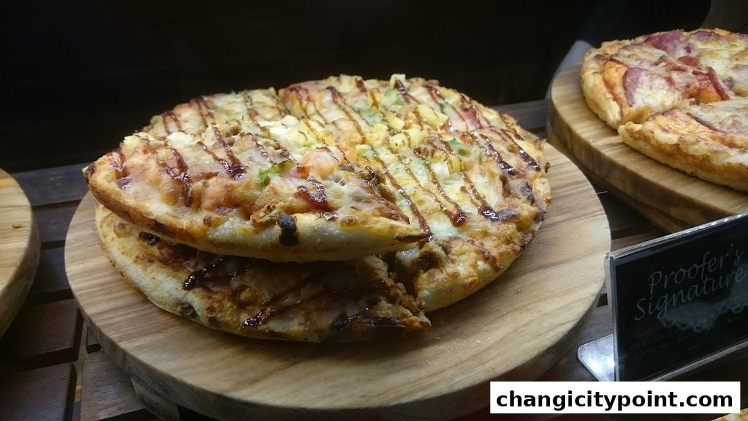 Two delicious pizzas are displayed on wooden boards, with one labeled 'Proofer's Signature'.